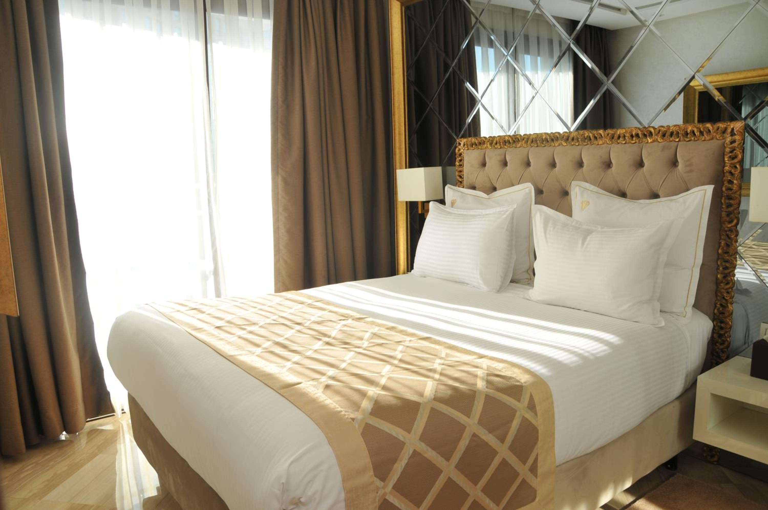 جناح جونيور كلاسيكي بسرير كينج وسرير كوين مع أريكة، Suite Hotel Casa Diamond 3/14