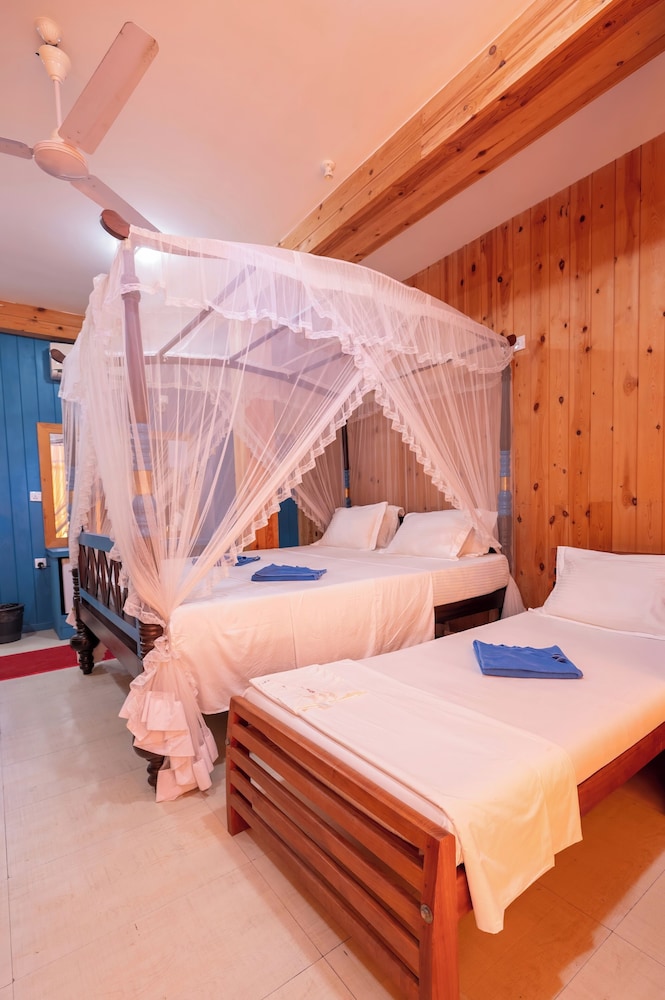 غرفة ديلوكس ثلاثية بسرير مزدوج وسرير فردي، Ocean Reach Holidays 2/7