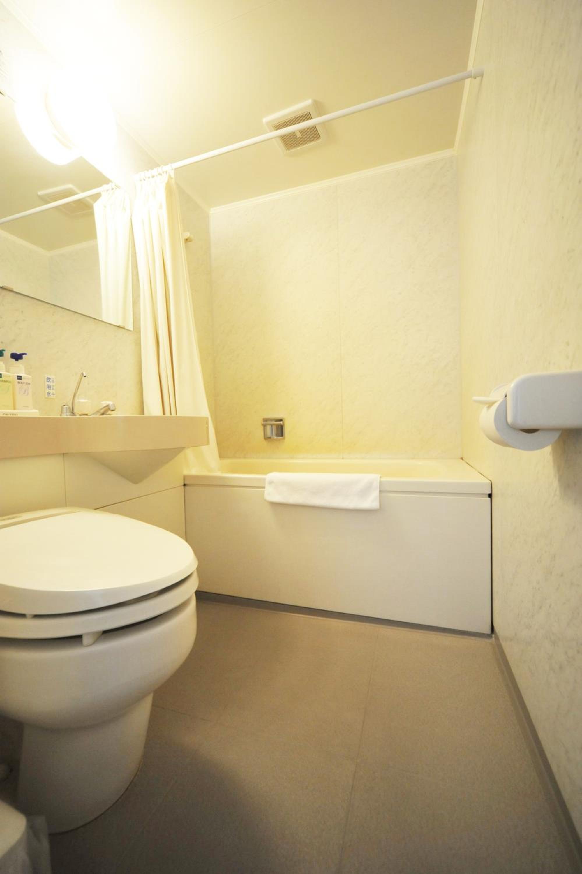 غرفة قياسية بسريرين منفصلين، Beppu Station Hotel 7/7
