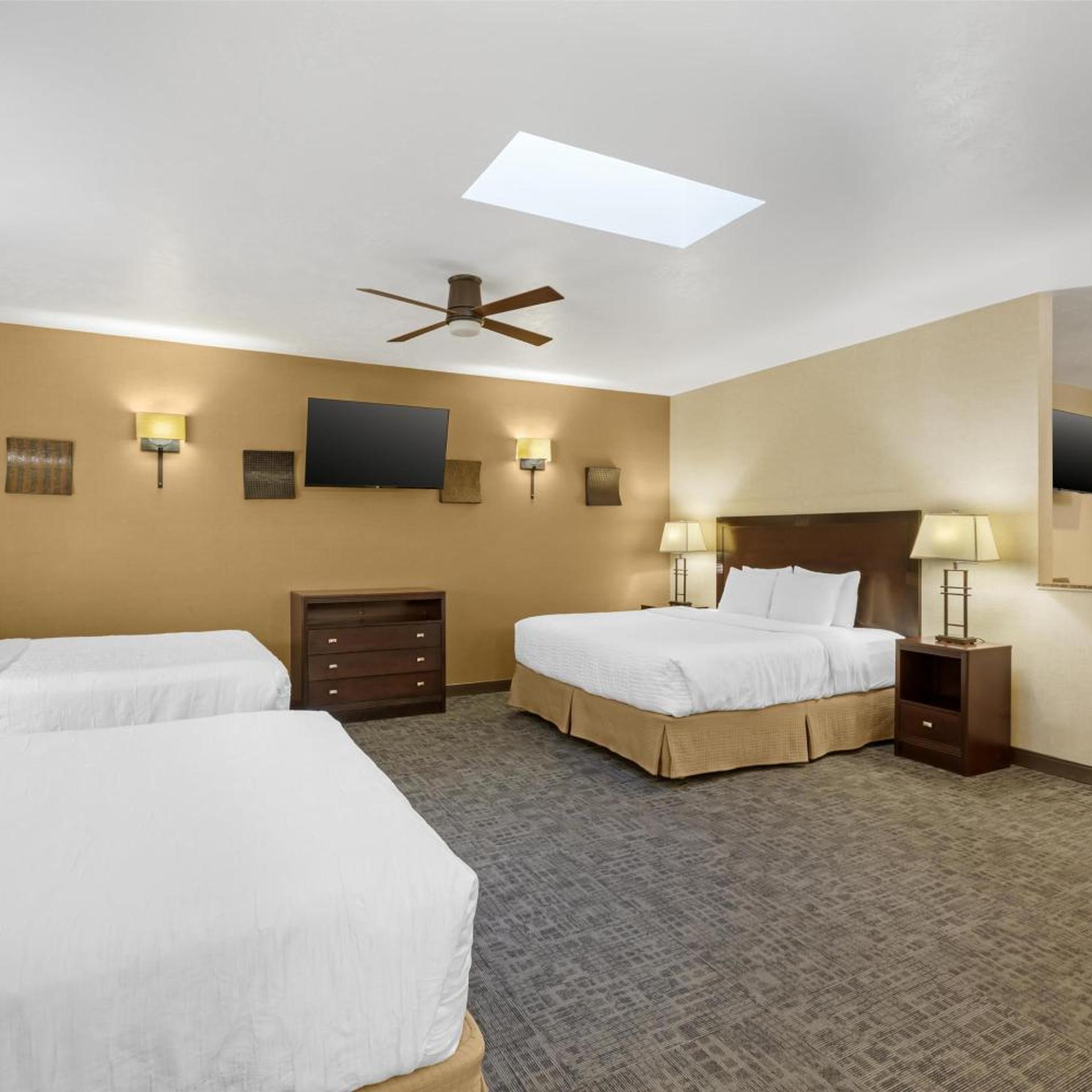 Family Suite, 1 King and 2 Queen Beds, Stair Access Only, Balcony