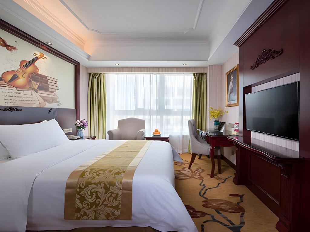 Vienna International Hotel (Shaoxing East Station Wanda) 25/38