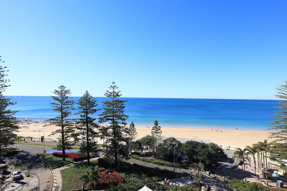 PENINSULAR BEACHFRONT RESORT 61/69