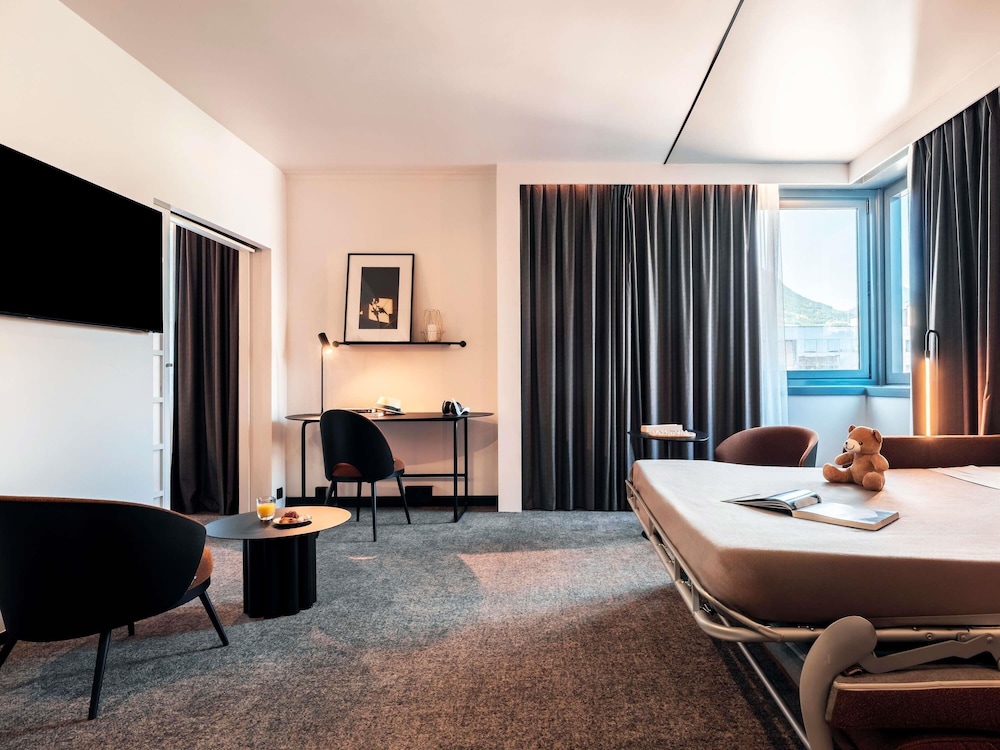 جناح بسرير كينج مع أريكة، NOVOTEL GRENOBLE CENTRE 3/6