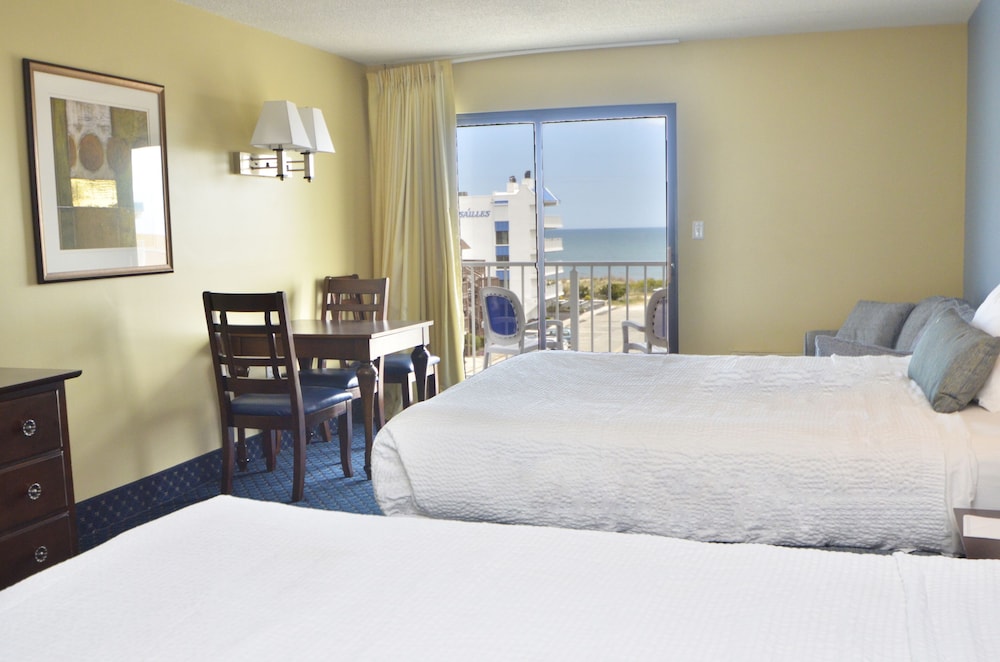 Coastal Palms Inn &amp; Suites 9/50