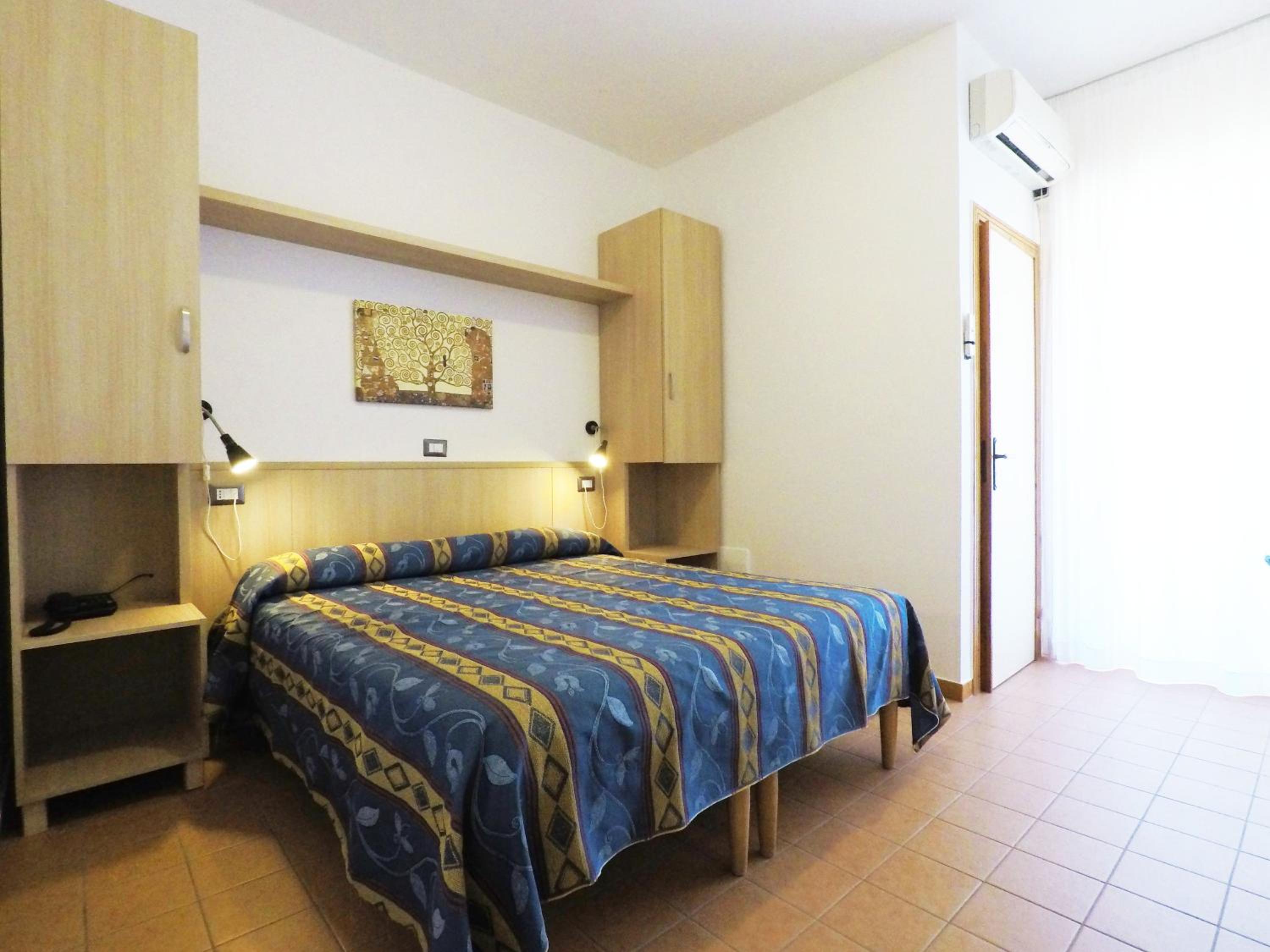 Classic, Triple, 1 Queen and 1 Single Bed