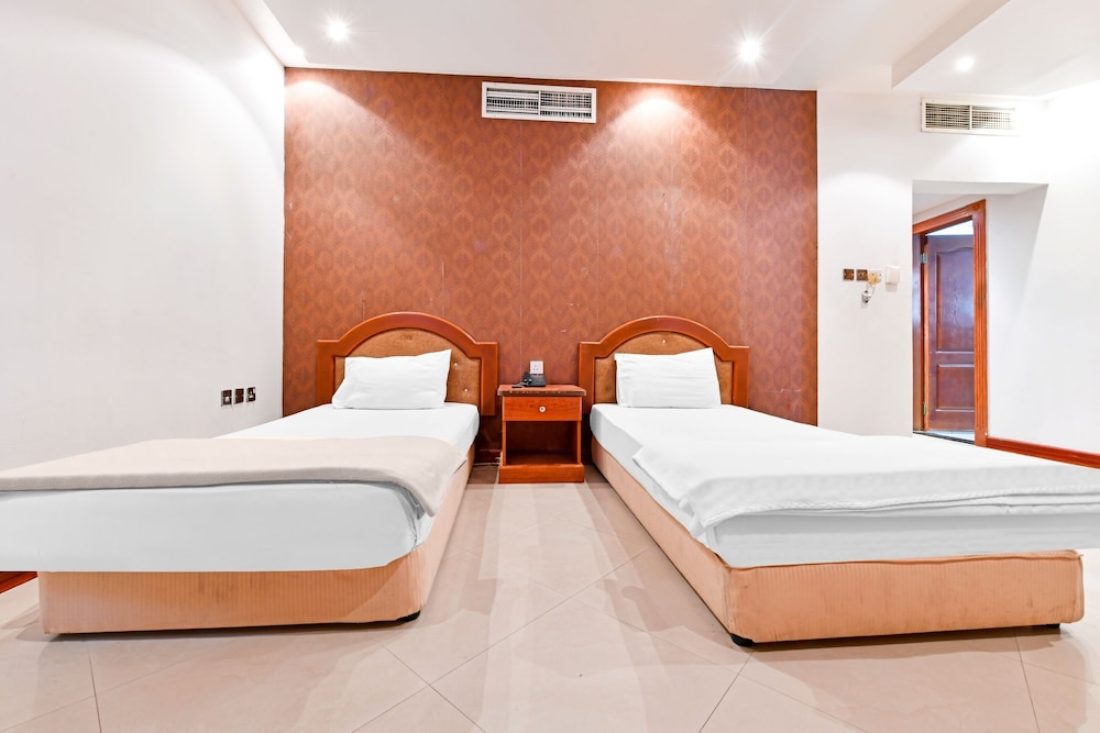 DELUXE, TWIN BEDS