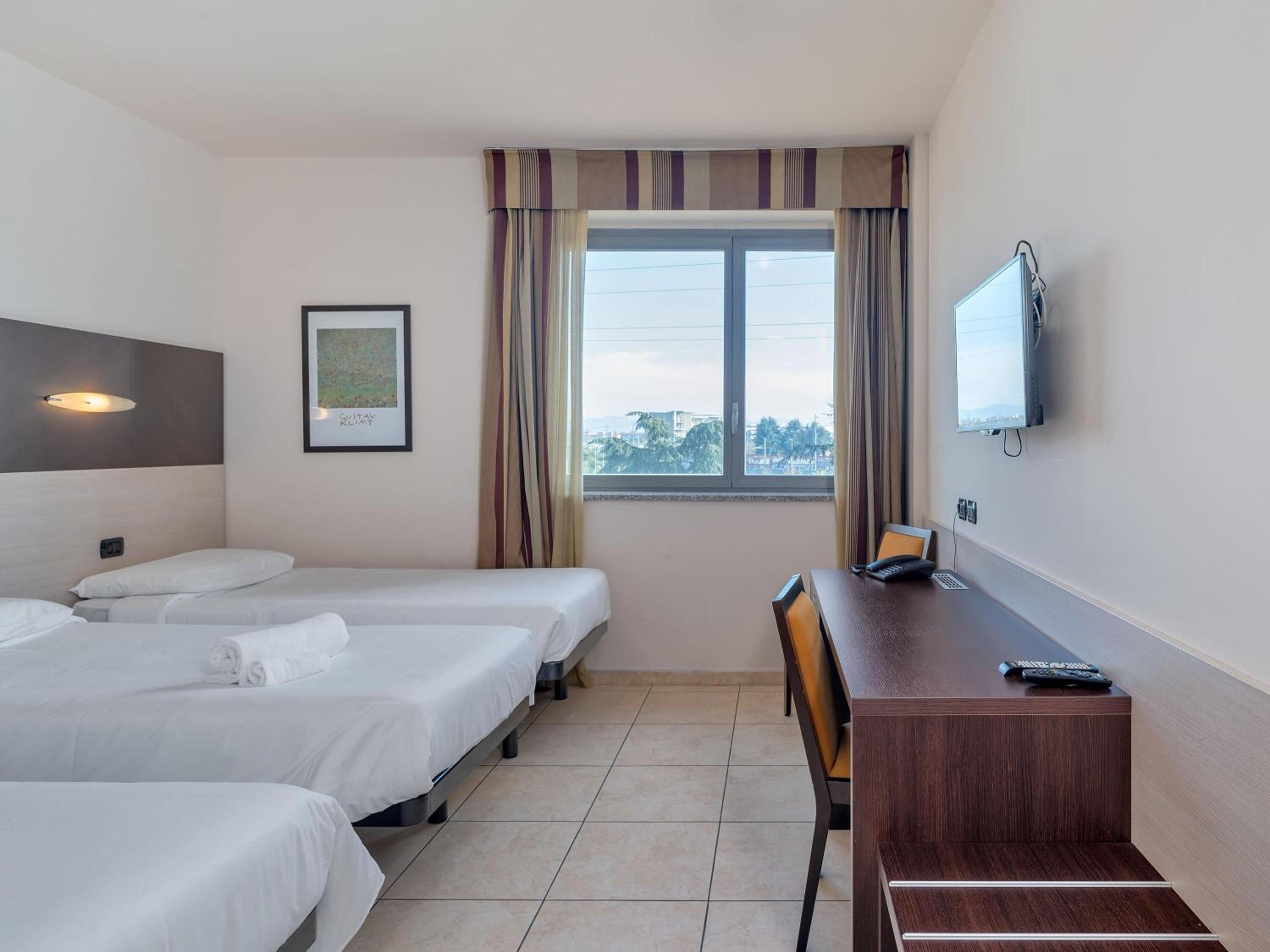 Triple Room Three Separate Beds، B&B HOTEL Settimo Torinese 7/10