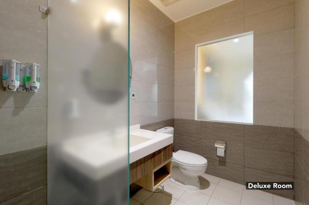 غرفة ديلوكس، Oyo 128 Mutiara Suites 6/6