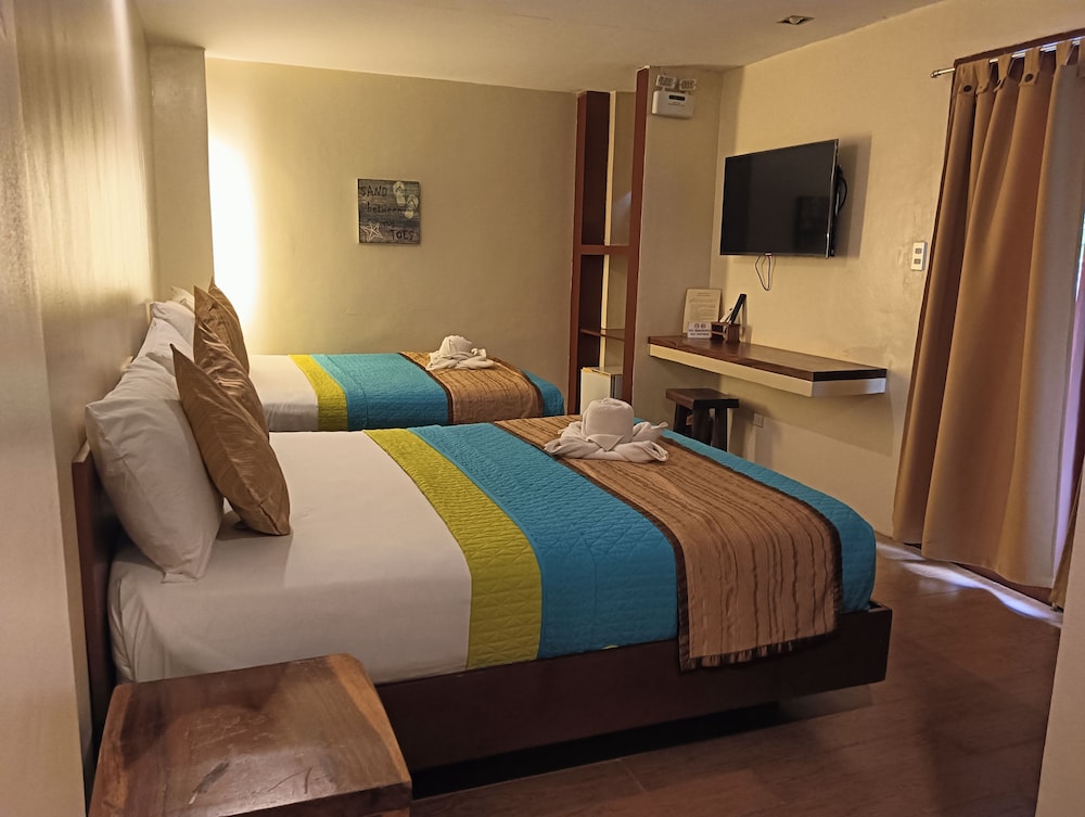 THE SITIO VILLAS AND SUITES 11/34