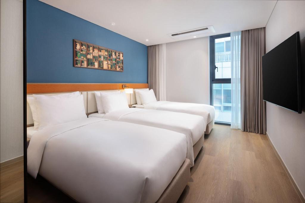 غرفة بريميوم بريفيليج بثلاثة أسرّة، Mercure Ambassador Seoul Dongdaemun 2/4