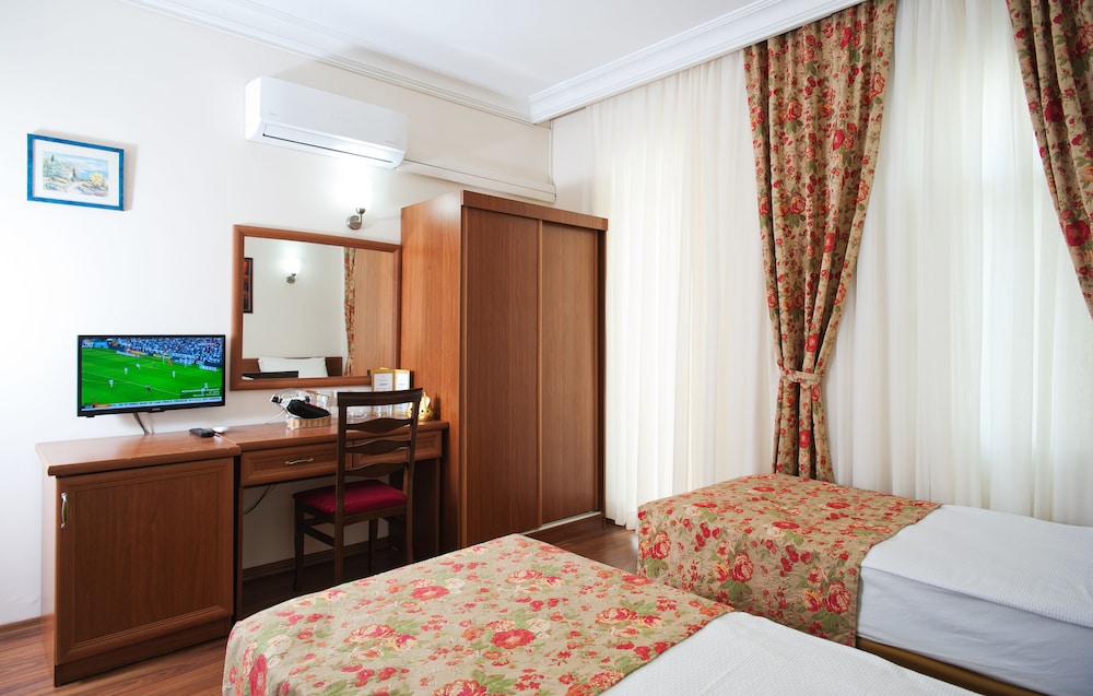 غرفة قياسية بسريرين منفصلين، Triana Hotel 6/9