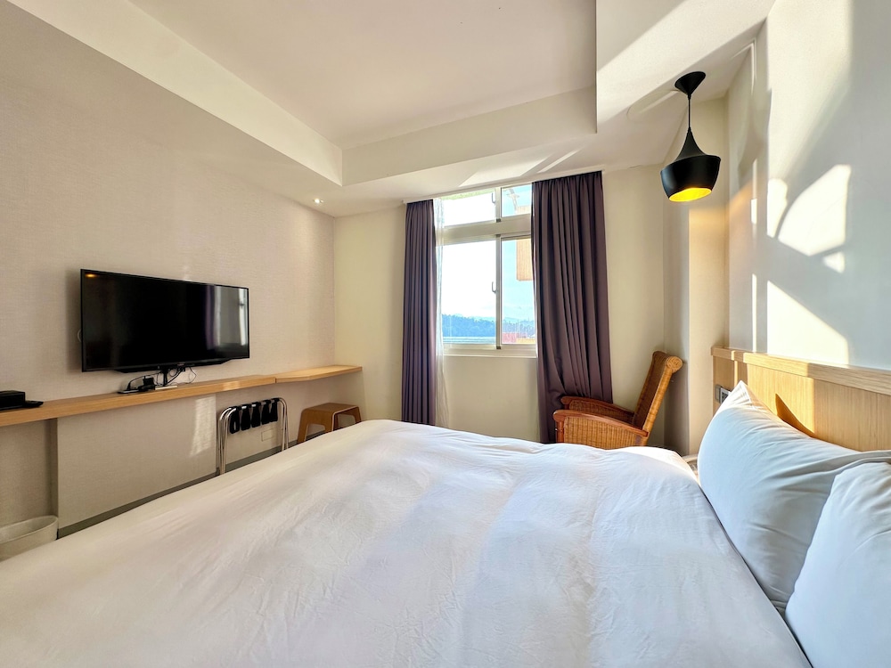 SUPERIOR, DOUBLE OR TWIN BED, PARTIAL LAKE VIEW