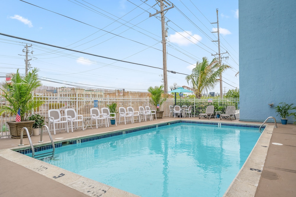 coastal palms inn and suites