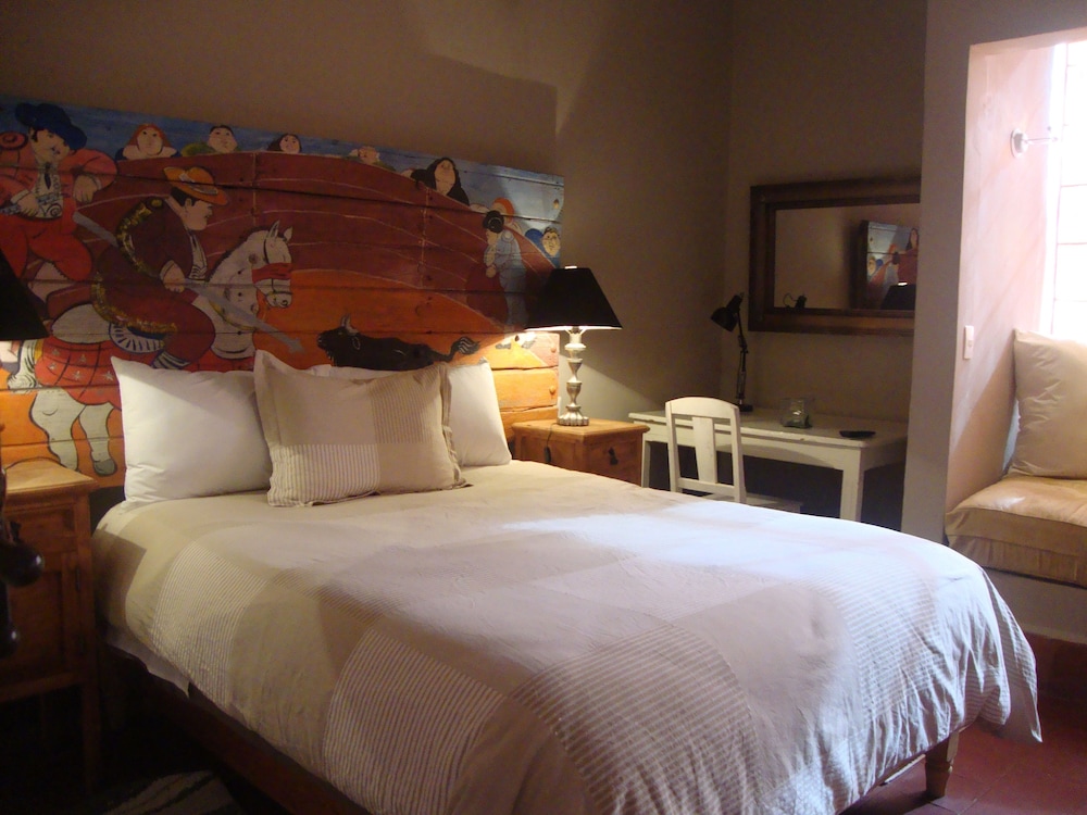 Suites Santo Domingo 16/78