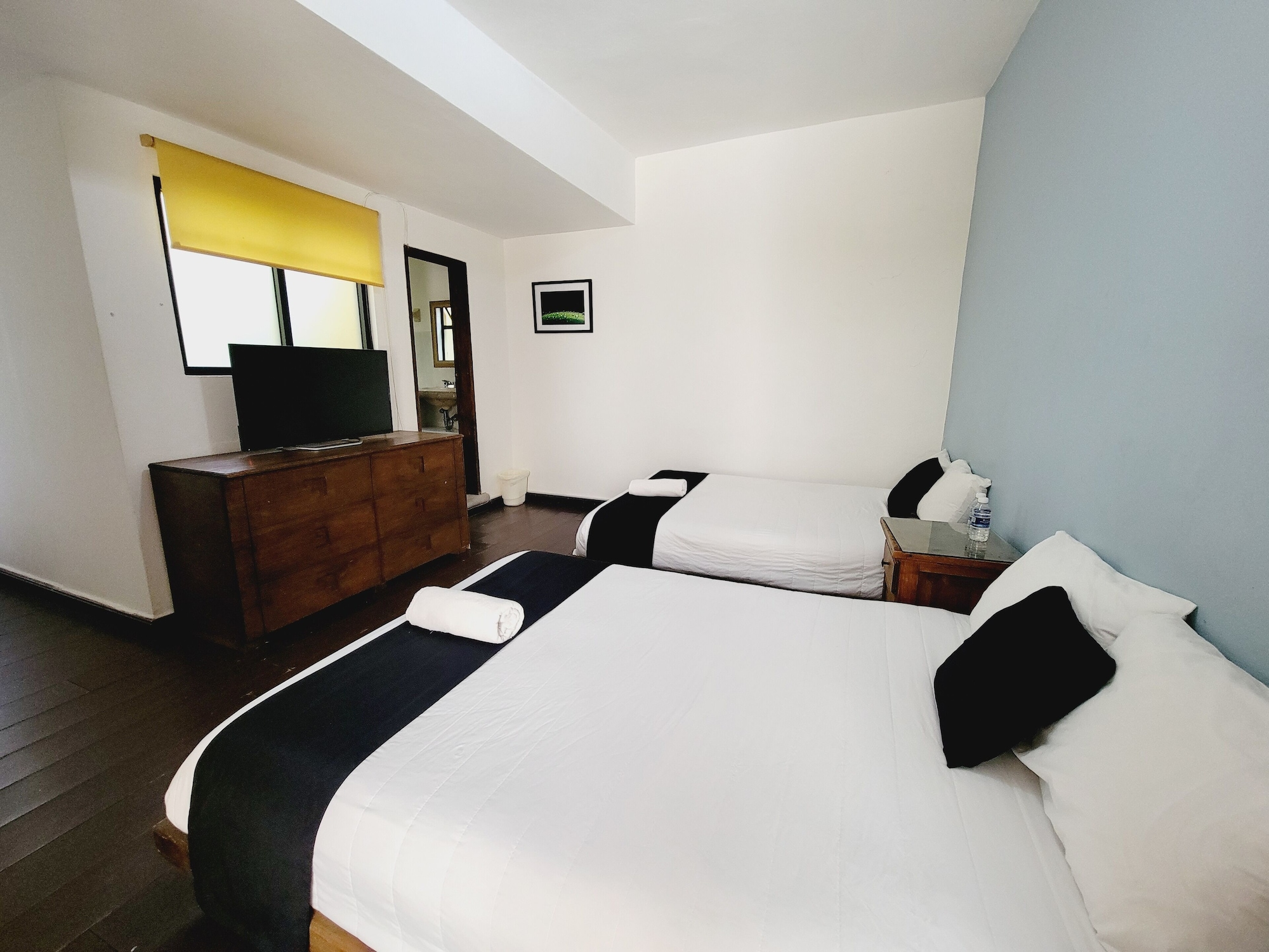 Superior, Triple, 1 Single and 2 Double Beds