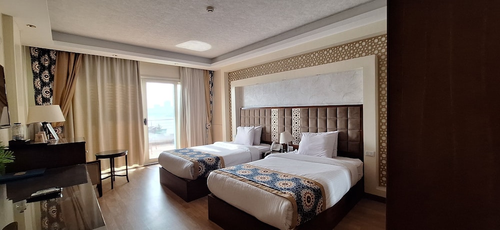 غرفة سوبيريور بسريرين منفصلين بإطلالة على النهر بغرفة نوم واحدة، Trans Nile Hotel 4/8