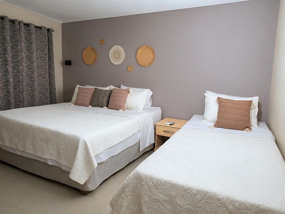 Standard, Quintuple, 1 Single and 2 Double Beds