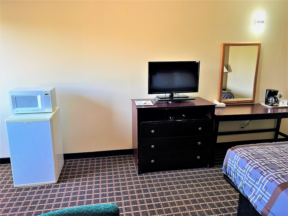 Designer Inn & Suites 57/69