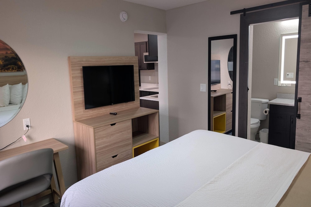Efficiency, King Bed, Sofa, Kitchenette