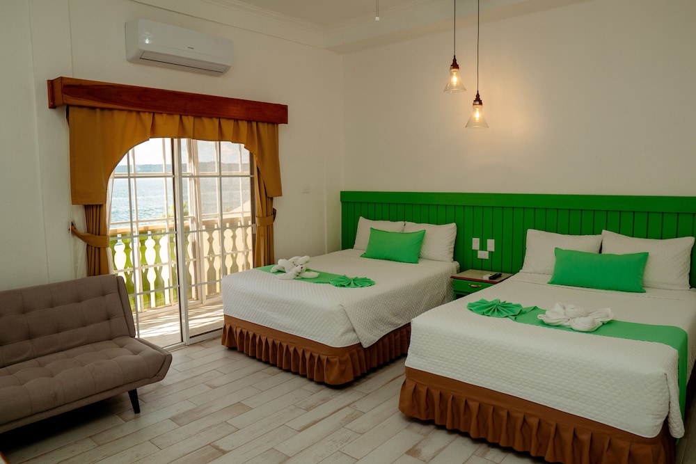 غرفة بريميوم ثلاثية بسريرين منفصلين مع أريكة، Hotel Petén 3/5