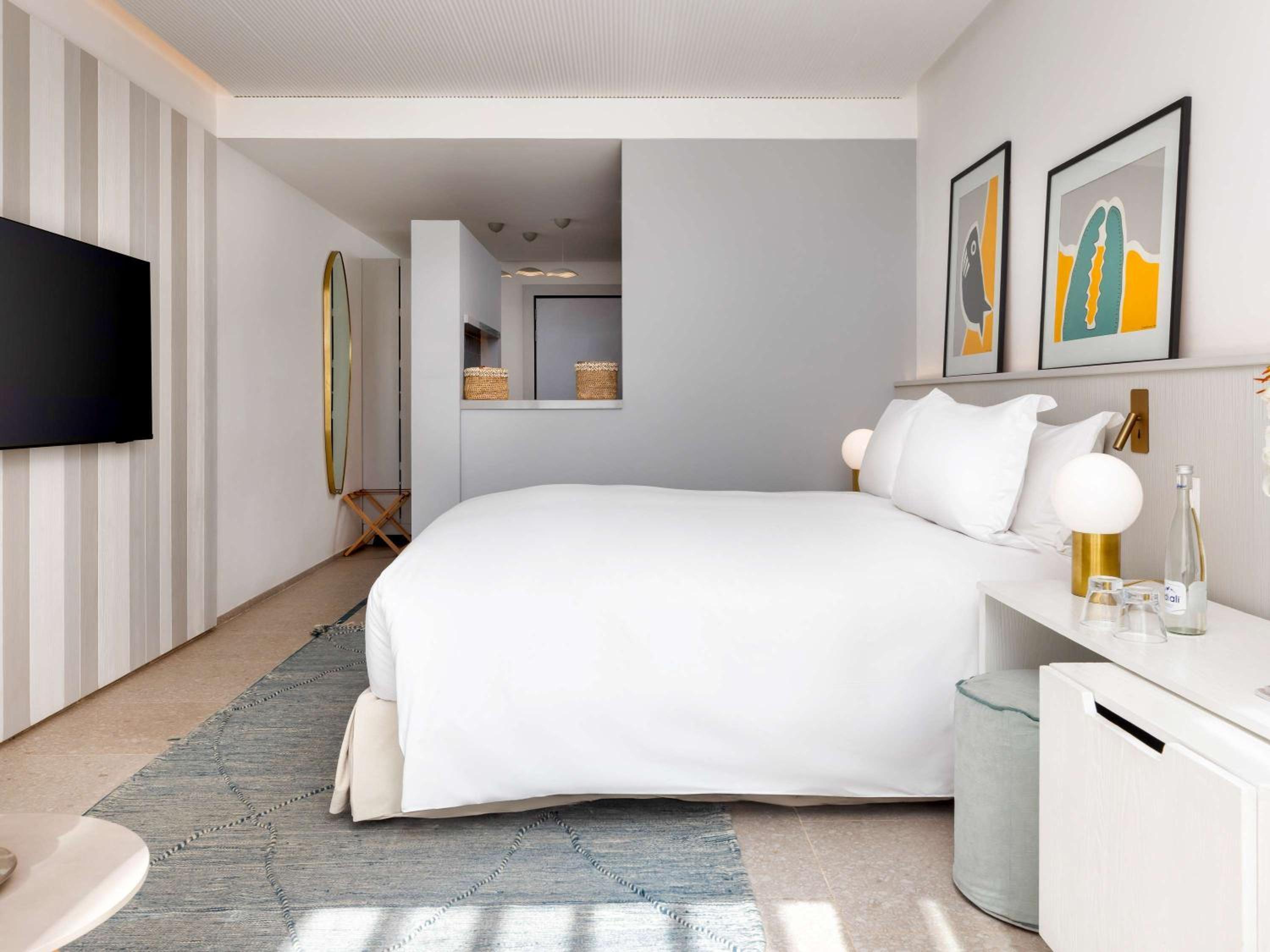 غرفة فاخرة بسرير كينج وسرير كوين بإطلالة على الحديقة، SOFITEL AGADIR THALASSA SEA AND SPA 7/10
