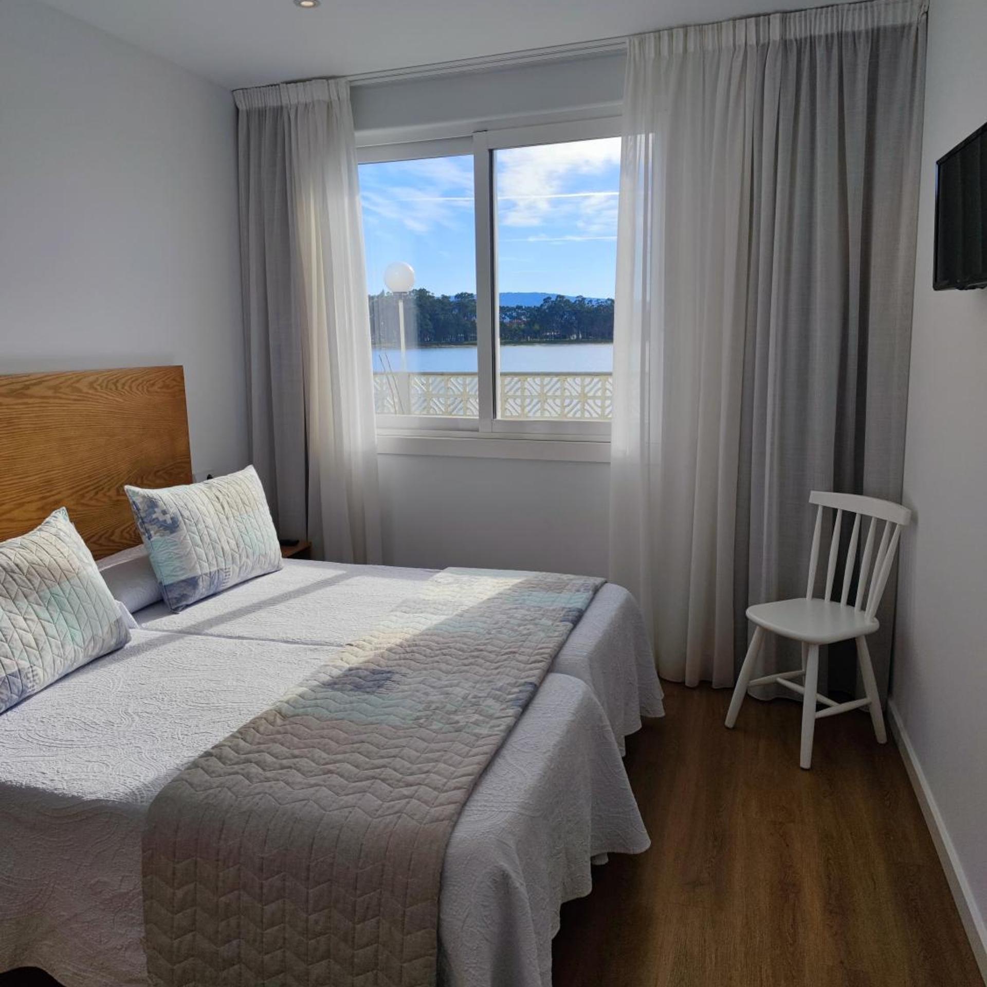 APARTAMENTOS LA TOJA 1/30