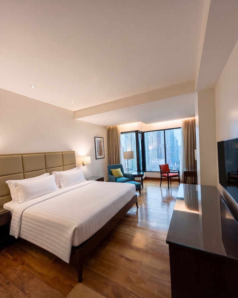 غرفة ديلوكس بسرير كينج، City Garden Grand Hotel 2/10