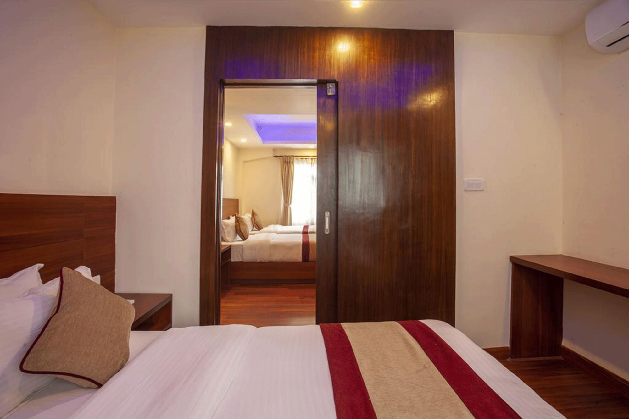 2 Bedrooms, Family Suite, King and Twin Beds