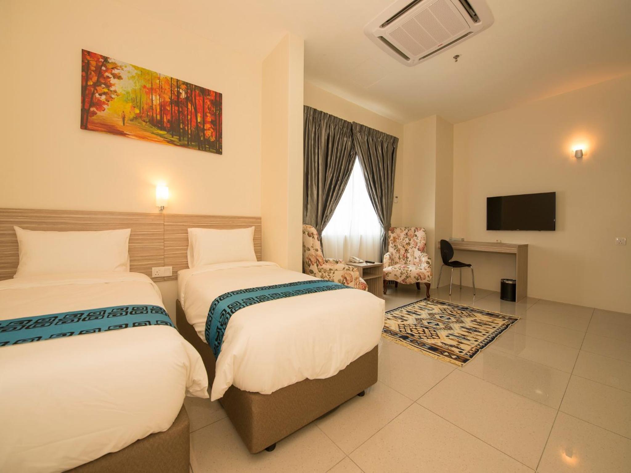 Deluxe Quad Room