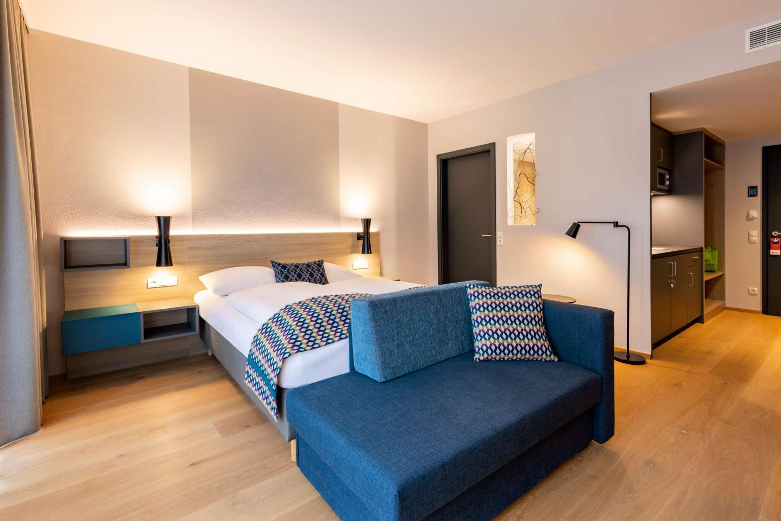 غرفة ديلوكس بسرير كوين مع أريكة، Parkhotel Maximilian Ottobeuren 2/10