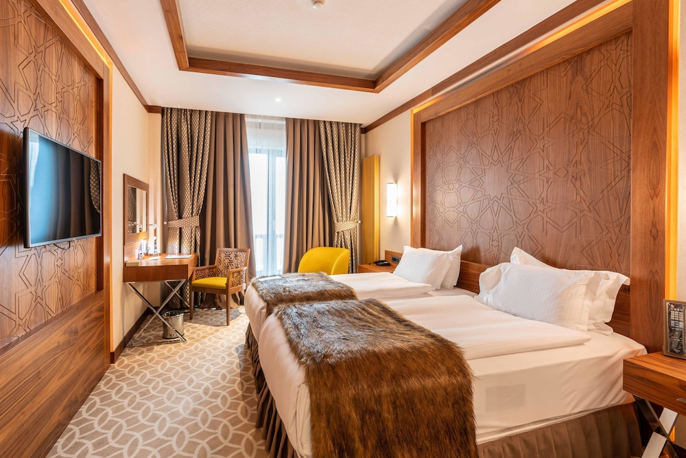 غرفة ديلوكس بسرير كوين، RAMADA RESORT ERCIYES 3/10