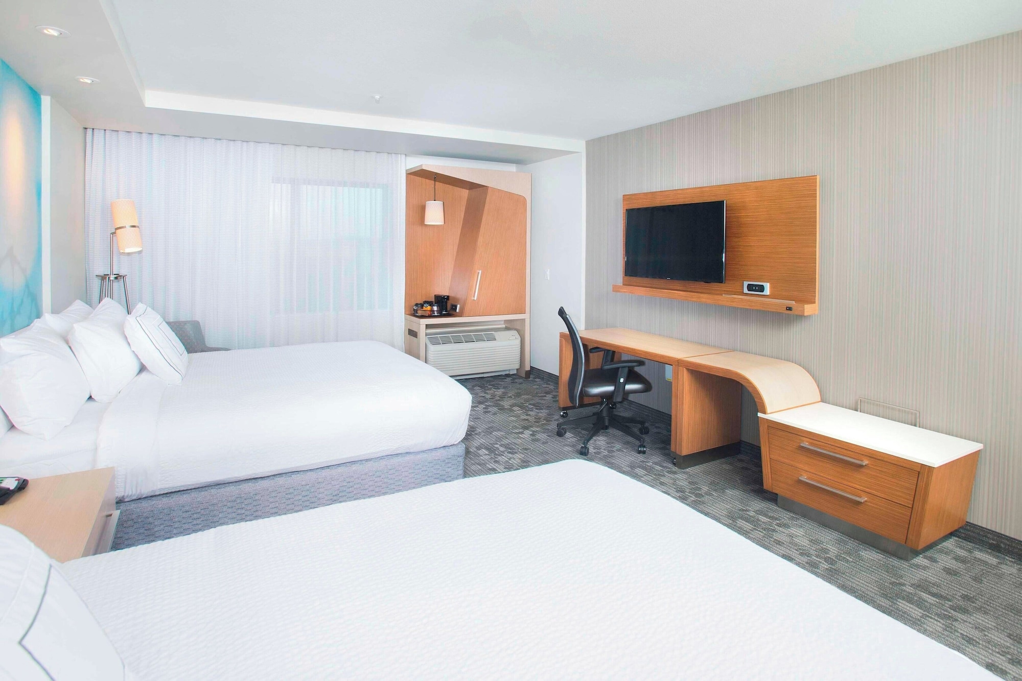غرفة بسريرين كوين لذوي الإعاقة