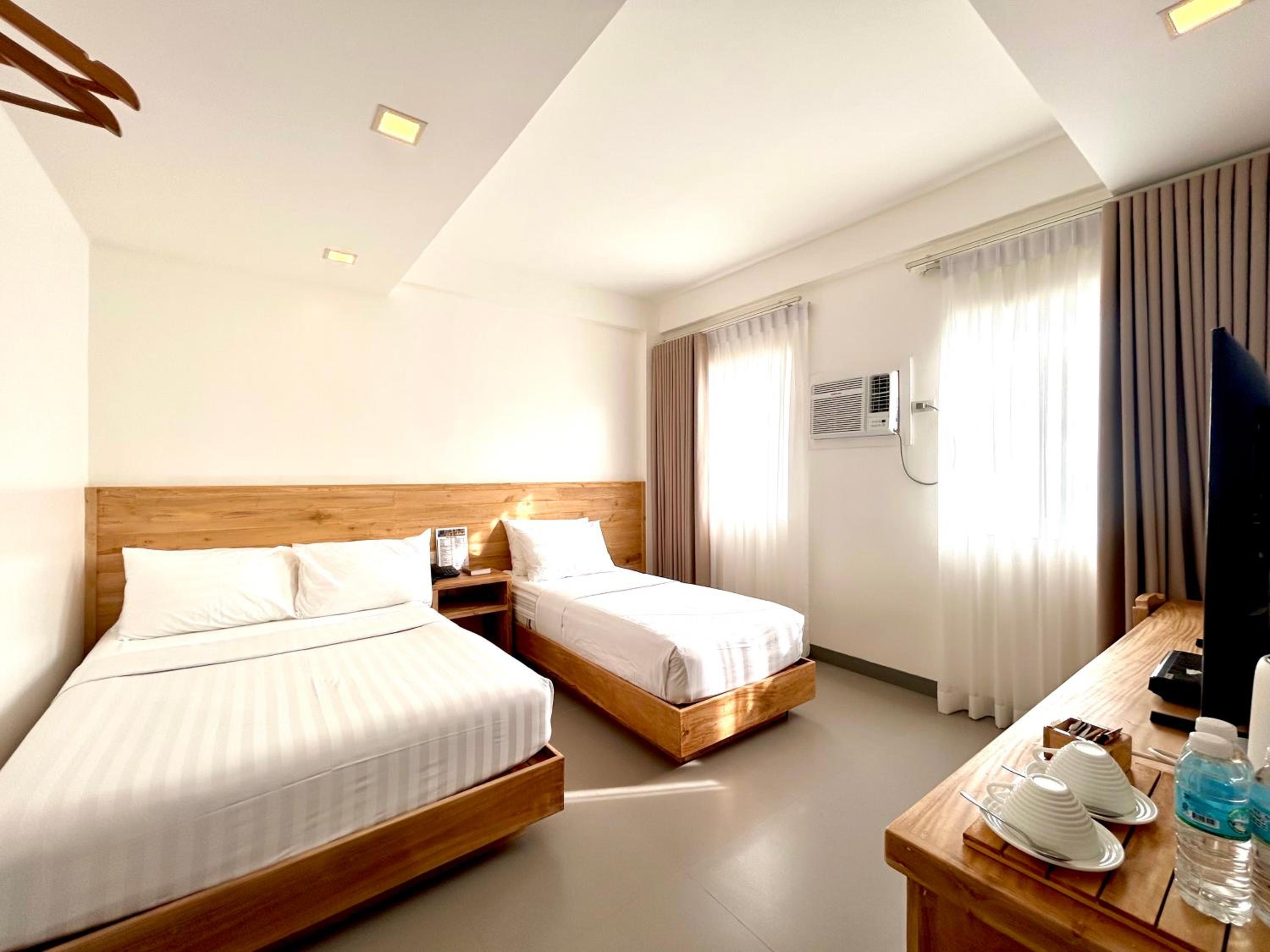 Standard, Triple, 1 Double and 1 Single Bed