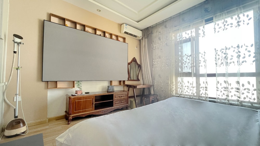 Dalian Bo Ke Business Apartment 25/50