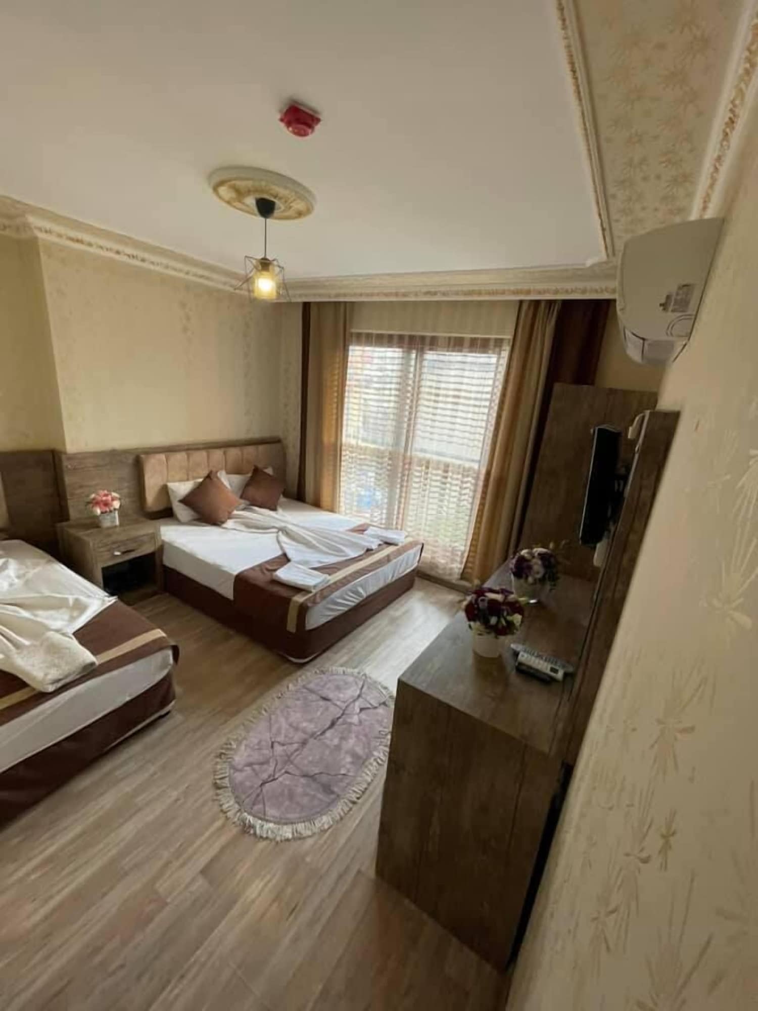غرفة عائلية بسرير كينج وسرير فردي بإطلالة على الحديقة، Ozgur Hotel 4/10