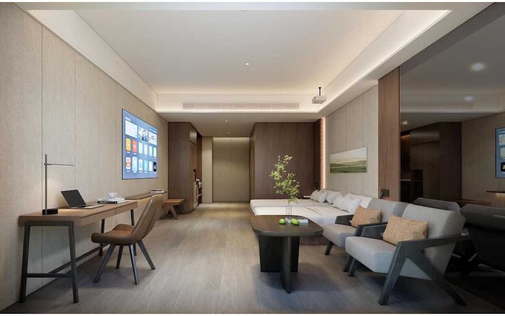 Xingyi International Hotel Poly Store 50/70