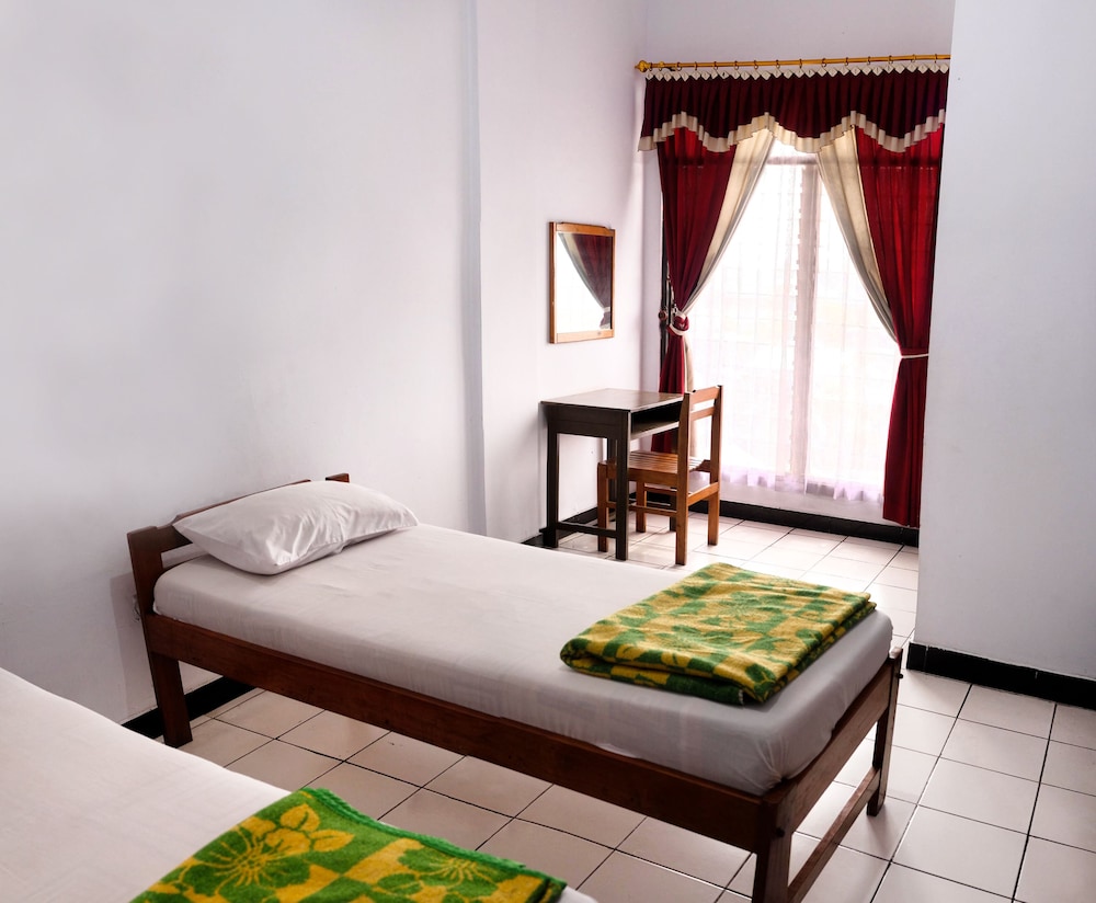 Hotel Wisata by ZUZU 11/50