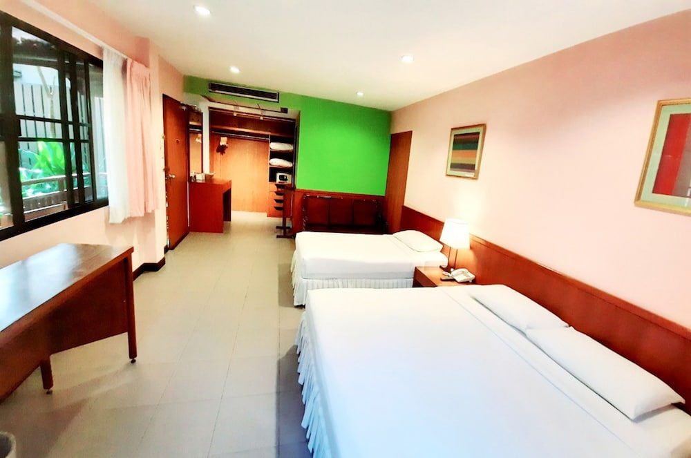 Garden, 1 King and 1 Single Beds