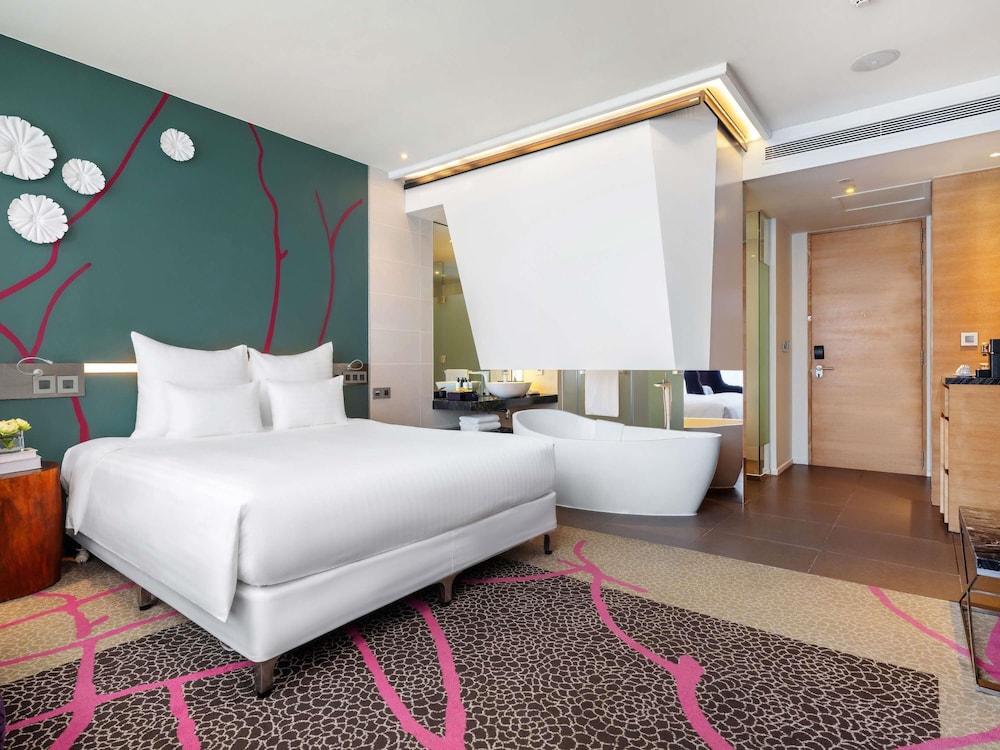 غرفة ديلوكس بسرير كينج، Pullman Saigon Centre 3/10