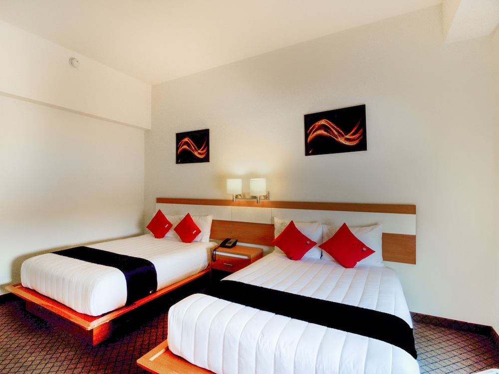 Capital O Hotel Herederos, Piedras Negras 1/35
