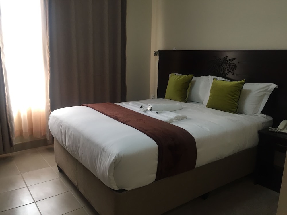 Cycad Palm Hotel 10/50