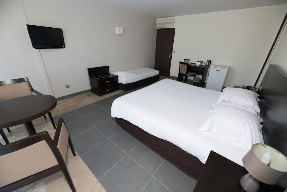 غرفة ثلاثية بسرير كينج وسرير فردي، Domaine de La Petite Isle 4/6
