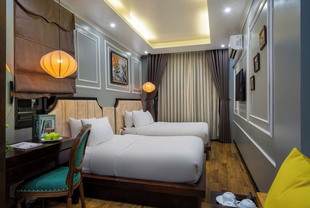 غرفة ثلاثية بسرير كوين وسرير فردي بغرفة نوم واحدة، Bella Rosa Hotel 2/5