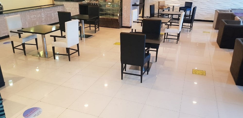 Tulip Hotel and Suites 50/65
