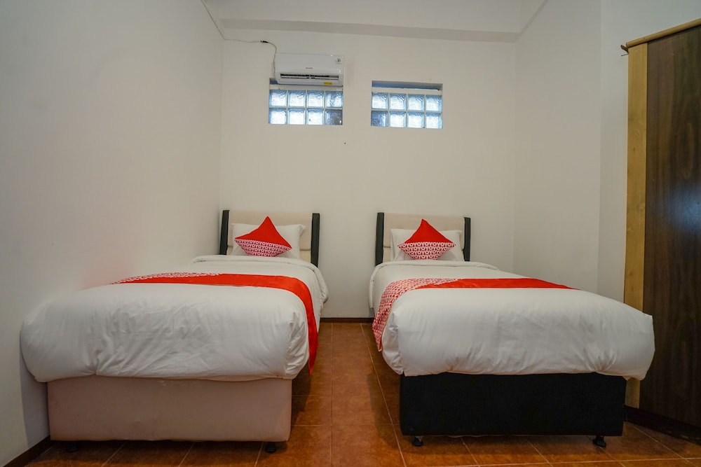 Super OYO 1844 Bravo Residence 18/39