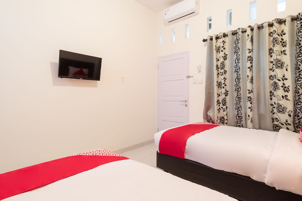 OYO 873 Kamani Homestay Syariah 14/17