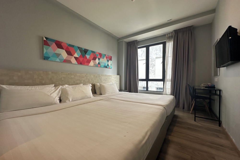 Deluxe, Triple, 1 Double and 1 Single Bed