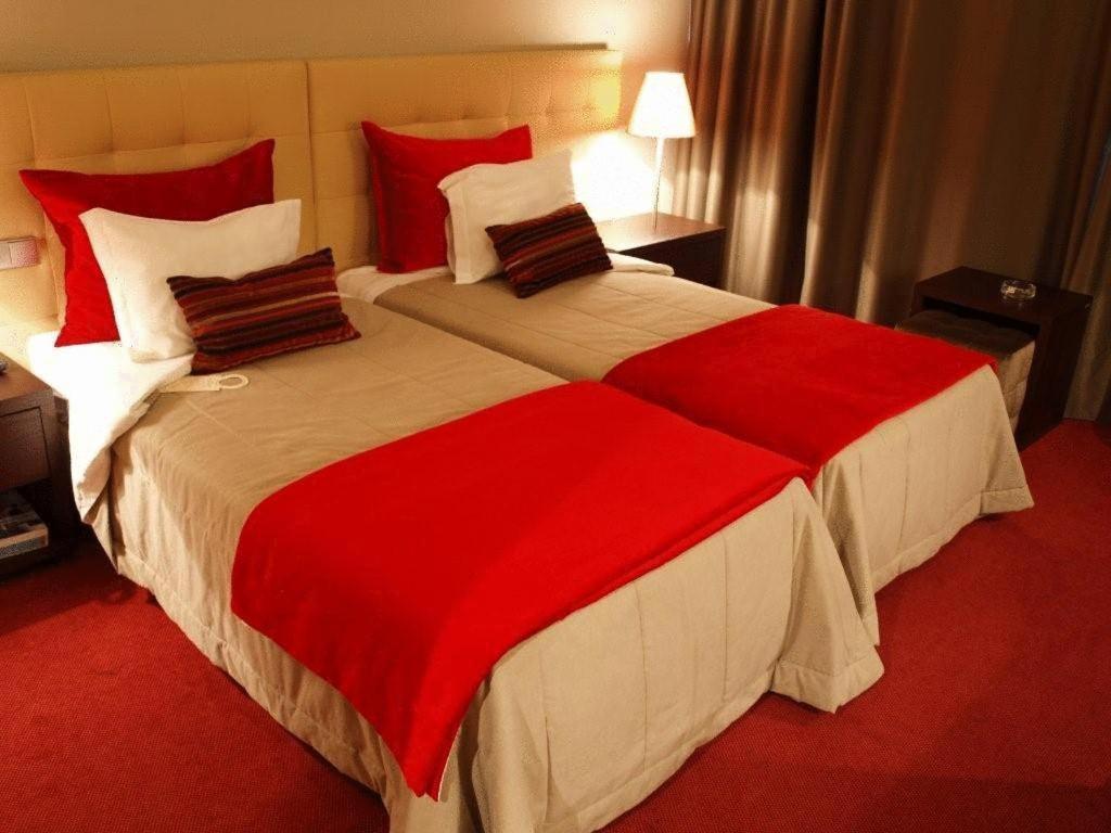 غرفة بسرير مزدوج أو سريرين منفصلين مع سرير إضافي