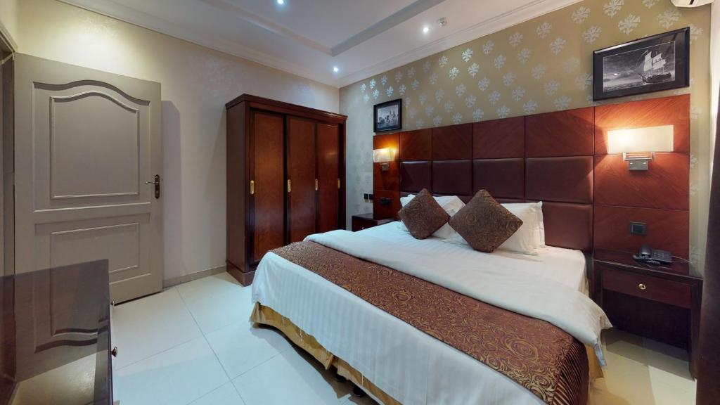 هابي بيتش البساتين(Shati Albasateen Serviced Apartments) 12/25