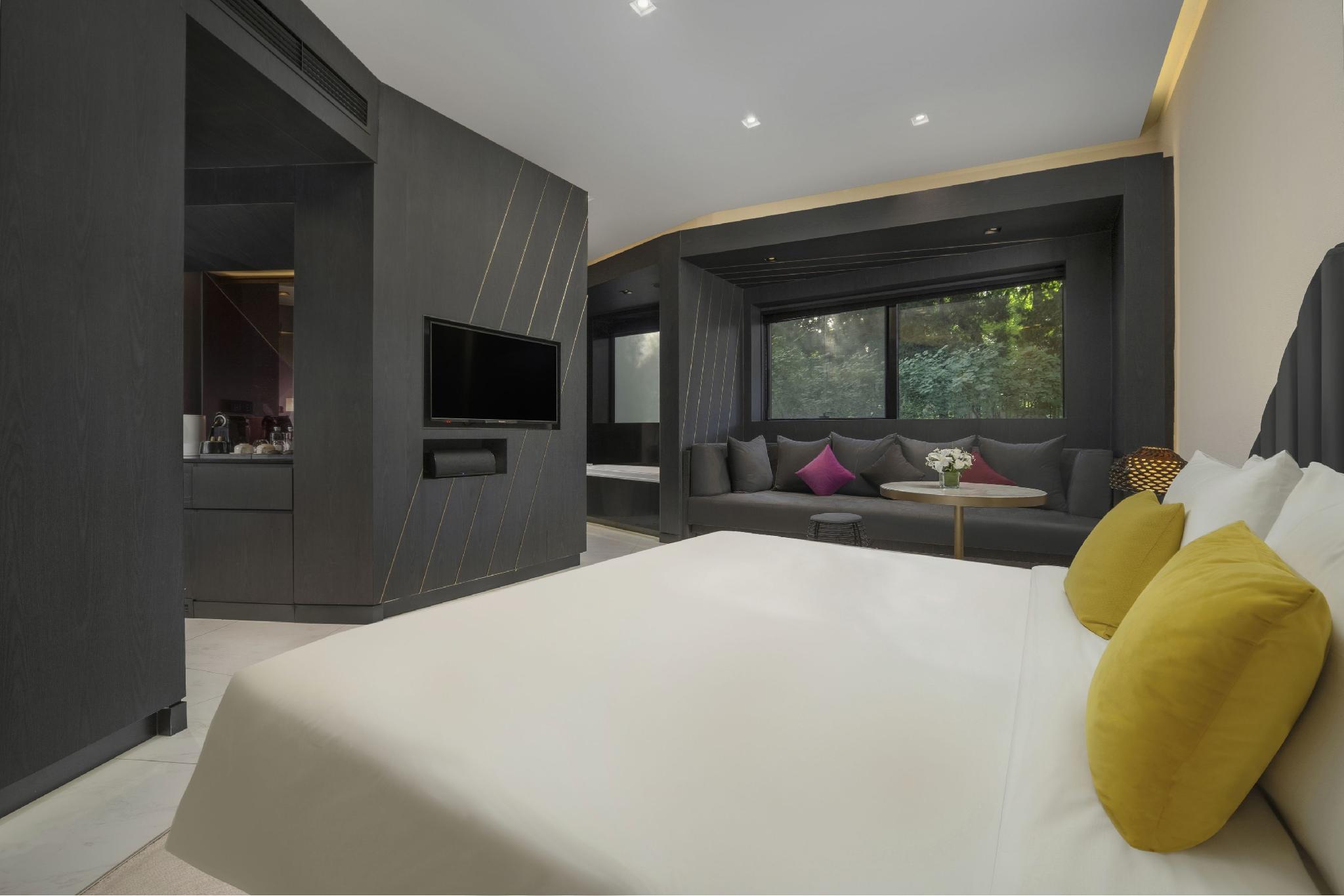 غرفة بسرير كينج بإطلالة على الحديقة، Blossom House Beijing Houhai 2/2